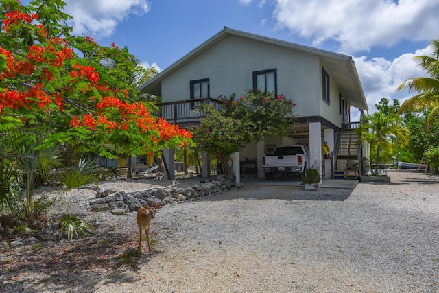 exterior space featuring a carport