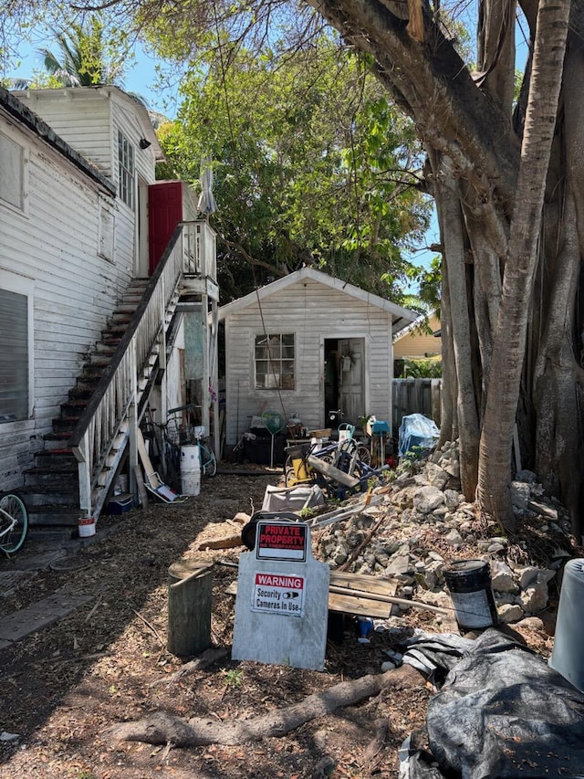 1428 Virginia St, Key West, FL 33040 - view of yard featuring stairs and an outdoor structure
