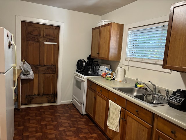 1428 Virginia St, Key West, FL 33040 - kitchen with white appliances, light countertops, and brown cabinets
