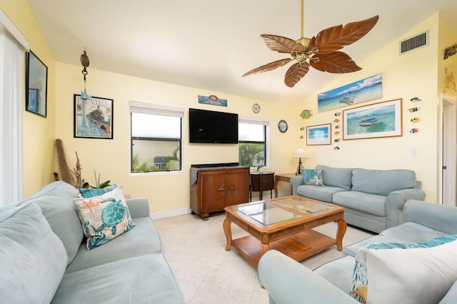 tiled living room featuring vaulted ceiling and ceiling fan