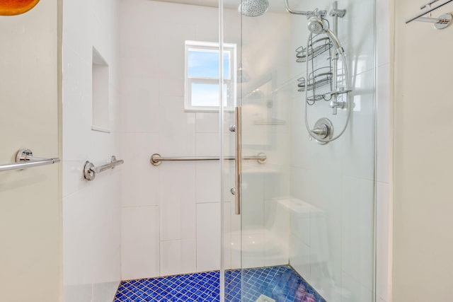 full bathroom featuring a stall shower