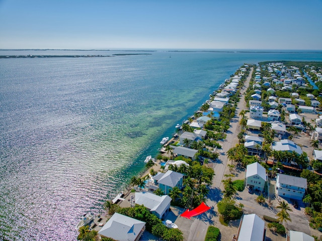 bird's eye view with a water view and a residential view