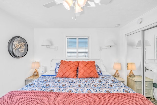 bedroom featuring a closet and ceiling fan