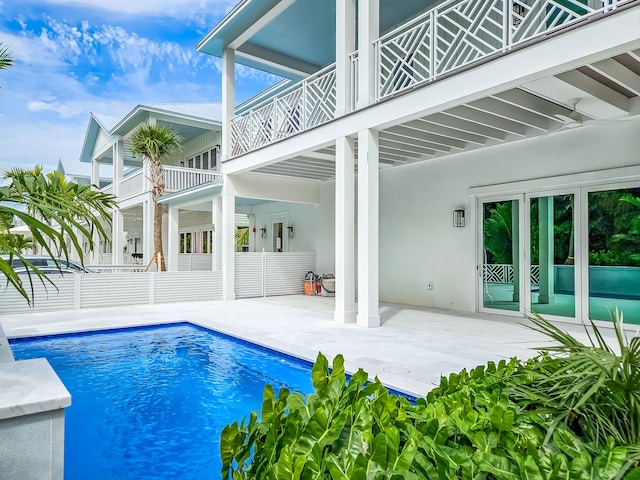 view of pool featuring a patio