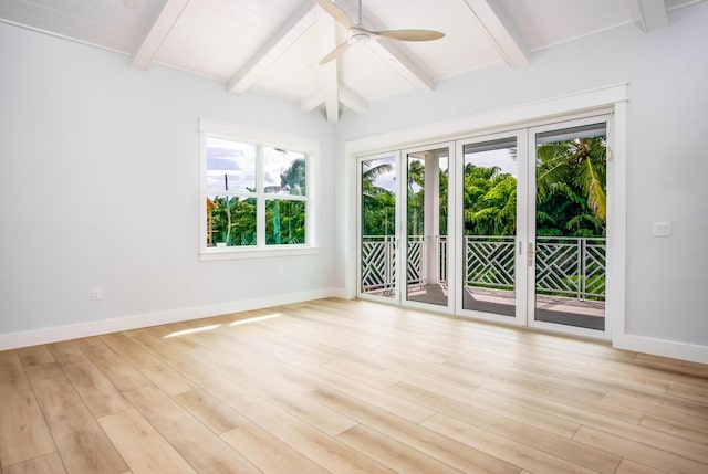 spare room with ceiling fan, beam ceiling, and light wood-type flooring