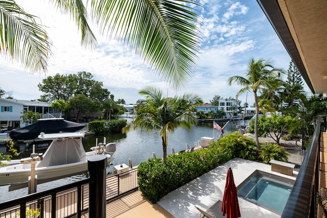 property view of water featuring a boat dock