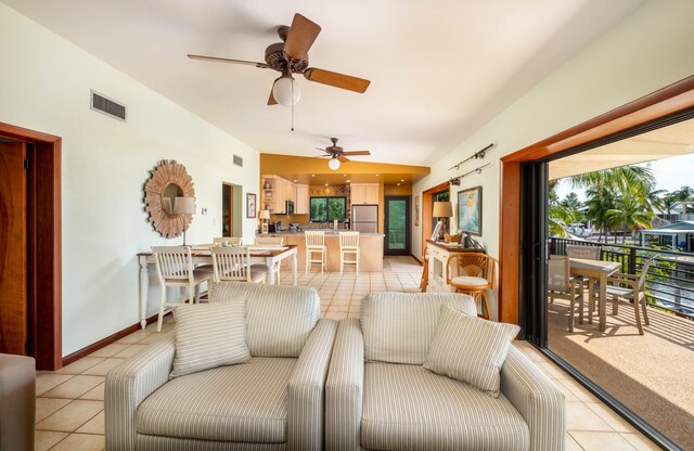 living room featuring light tile patterned flooring