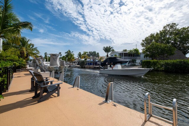 dock area featuring a water view