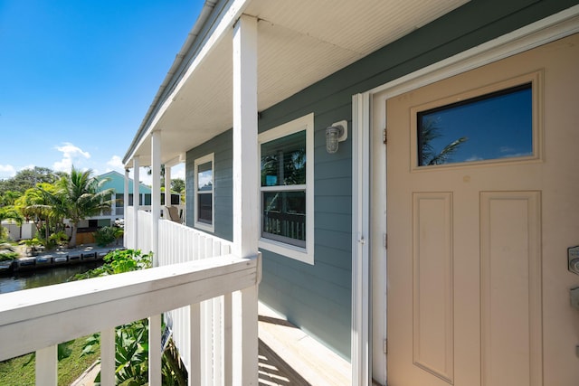 view of exterior entry featuring a water view