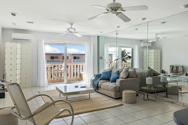 tiled living room featuring ceiling fan, a healthy amount of sunlight, and a wall mounted air conditioner