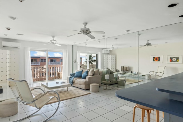 living room featuring light tile patterned floors and a wall unit AC