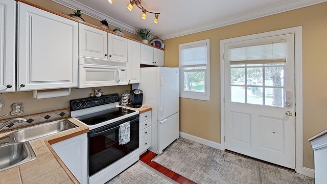 kitchen featuring sink, light wood-type flooring, white cabinets, ornamental molding, and white appliances