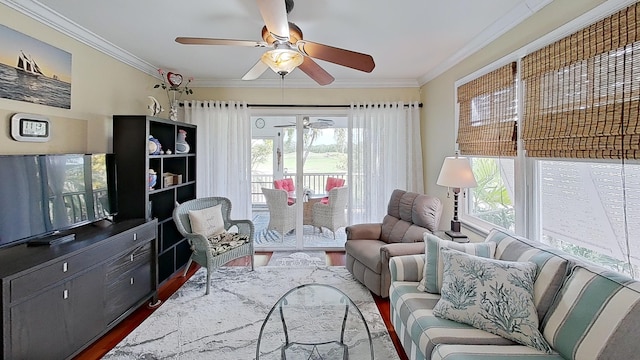 living room with crown molding, dark hardwood / wood-style floors, and ceiling fan