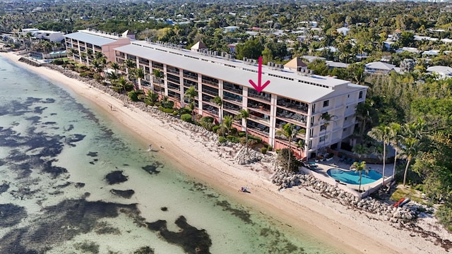 drone / aerial view featuring a beach view