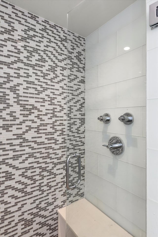 bathroom featuring a stall shower