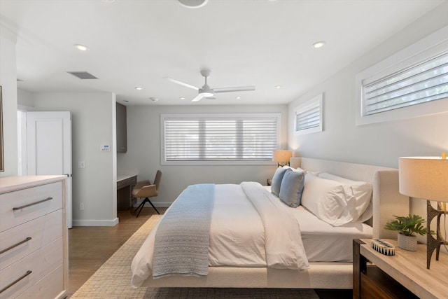 bedroom with visible vents, baseboards, ceiling fan, wood finished floors, and recessed lighting