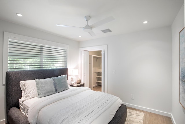 bedroom with recessed lighting, visible vents, light wood-style flooring, and baseboards