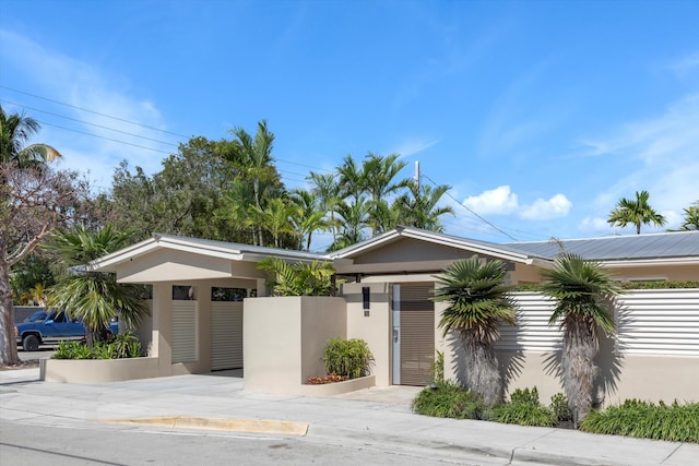 view of front of home featuring stucco siding