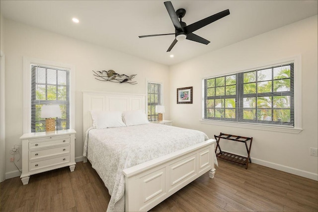 bedroom featuring dark hardwood / wood-style floors and ceiling fan