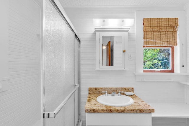 89251 Old Hwy, Islamorada, FL 33070 - bathroom with vanity, an enclosed shower, and wooden walls