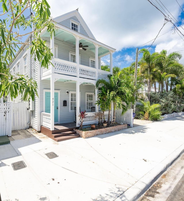 421 United St, Key West, FL 33040 - view of front of property with ceiling fan, covered porch, and a balcony