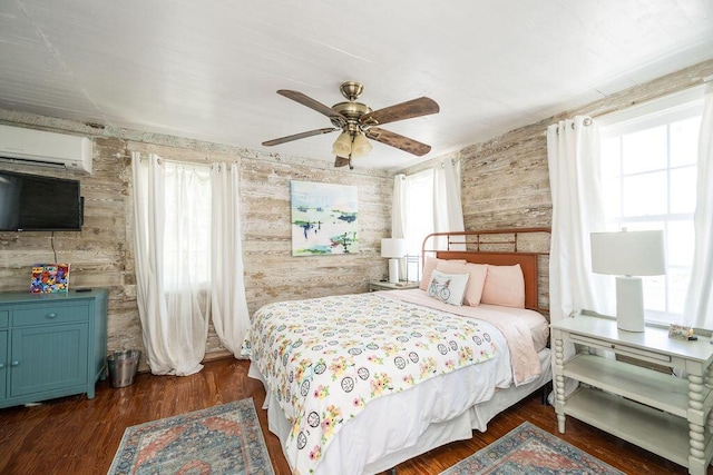 421 United St, Key West, FL 33040 - bedroom with ceiling fan, a wall mounted AC, and dark hardwood / wood-style flooring