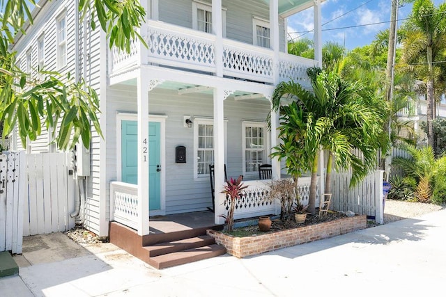 421 United St, Key West, FL 33040 - property entrance featuring a balcony and a porch