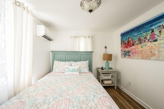 421 United St, Key West, FL 33040 - bedroom featuring dark wood-type flooring and an AC wall unit