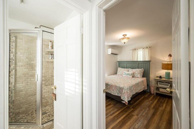 421 United St, Key West, FL 33040 - bedroom with dark hardwood / wood-style floors and a wall unit AC