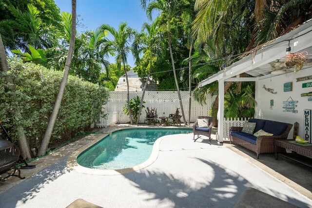421 United St, Key West, FL 33040 - view of swimming pool with an outdoor living space and a patio