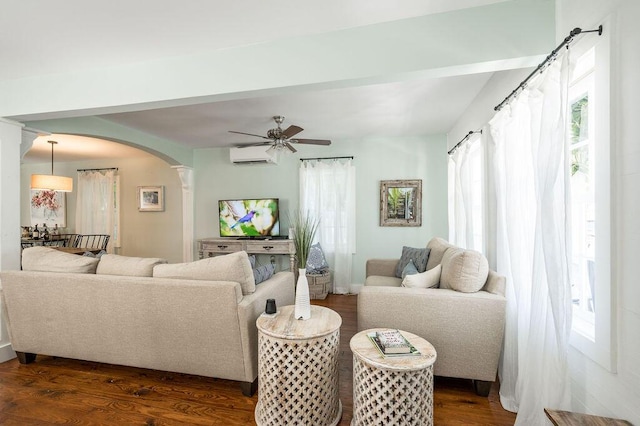 421 United St, Key West, FL 33040 - living room featuring dark wood-type flooring, a wall unit AC, and ceiling fan