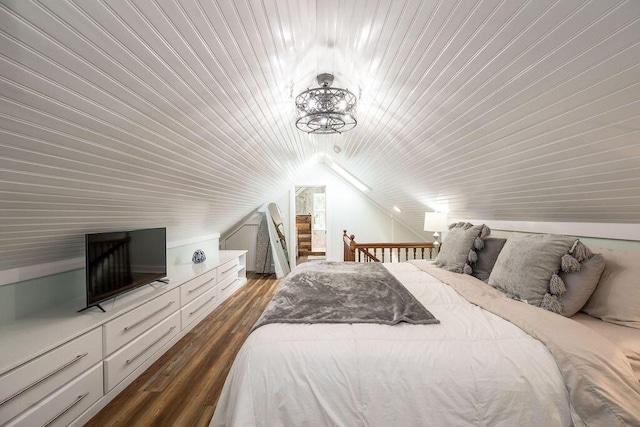 421 United St, Key West, FL 33040 - bedroom featuring dark hardwood / wood-style flooring, a notable chandelier, and vaulted ceiling