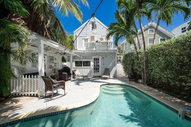421 United St, Key West, FL 33040 - rear view of property with ceiling fan, a fenced in pool, and a patio