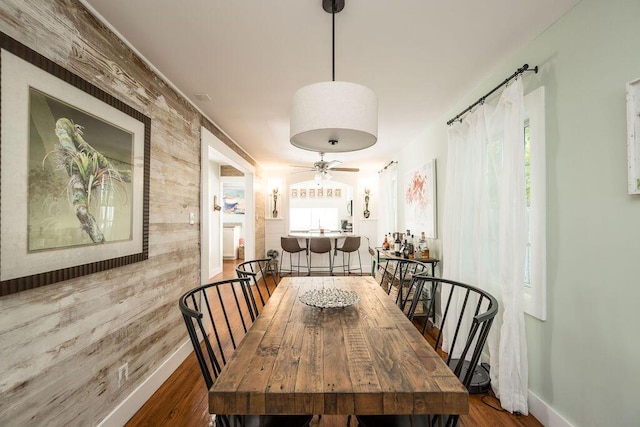 421 United St, Key West, FL 33040 - dining room featuring hardwood / wood-style floors and wooden walls