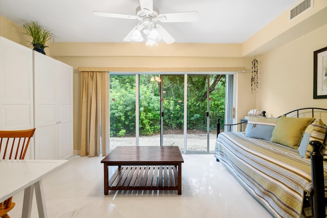 bedroom featuring access to exterior and ceiling fan