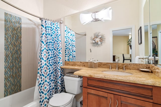 full bathroom featuring vanity, shower / tub combo, and toilet