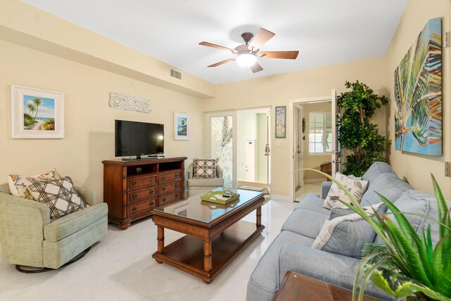 living room with ceiling fan