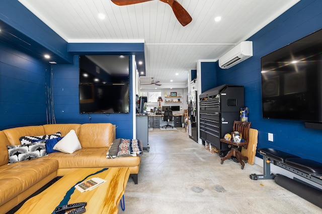 living area featuring a wall unit AC, recessed lighting, a ceiling fan, and concrete flooring