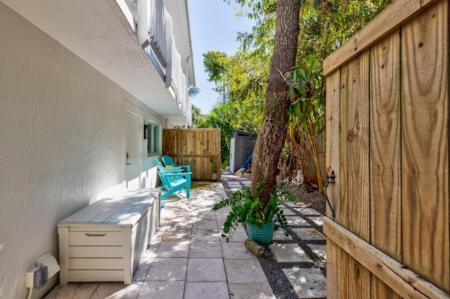 view of patio / terrace featuring fence