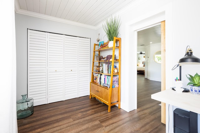 interior space featuring dark wood finished floors and crown molding