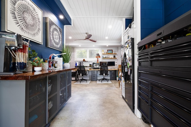 garage with recessed lighting, wood ceiling, and a ceiling fan