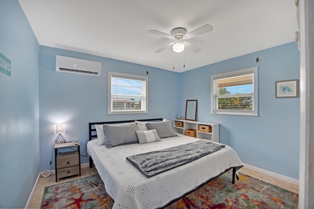 tiled bedroom featuring multiple windows, an AC wall unit, and ceiling fan