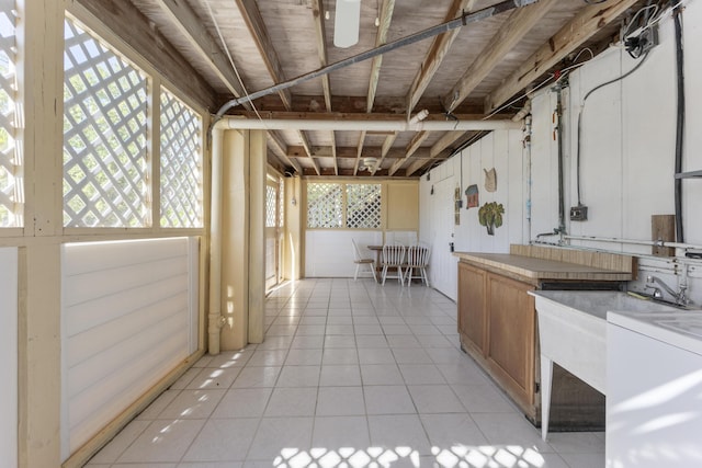 kitchen with light tile patterned floors