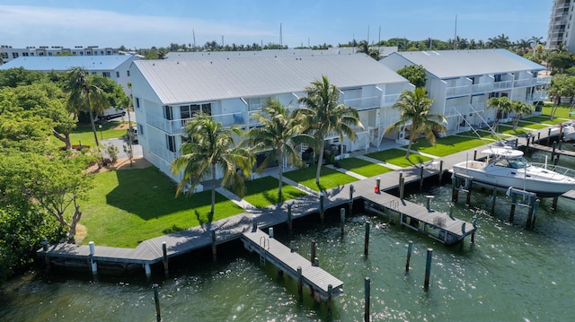 95 Coco Plum Dr Unit 1A, Marathon, FL 33050 - dock area with a lawn and a water view