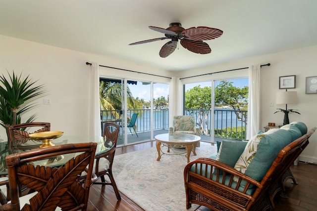 95 Coco Plum Dr Unit 1A, Marathon, FL 33050 - living room with ceiling fan, dark wood finished floors, and a water view