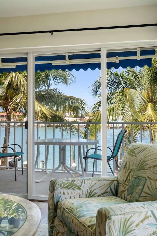 95 Coco Plum Dr Unit 1A, Marathon, FL 33050 - sunroom featuring a water view