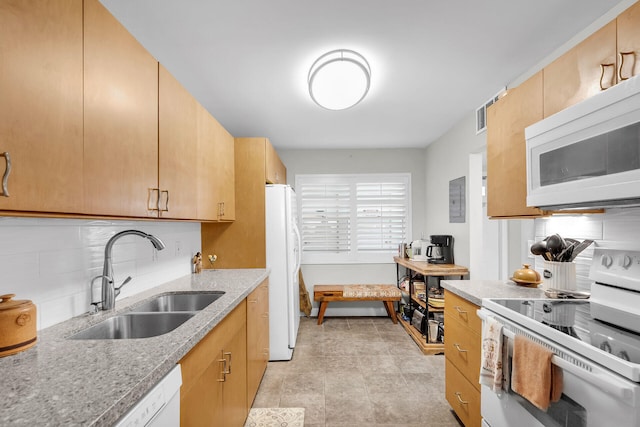 1901 S Roosevelt Blvd Unit 104N, Key West, FL 33040 - kitchen featuring white appliances, backsplash, light stone counters, and electric panel
