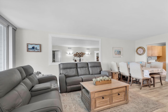 1901 S Roosevelt Blvd Unit 104N, Key West, FL 33040 - living room with light wood-type flooring