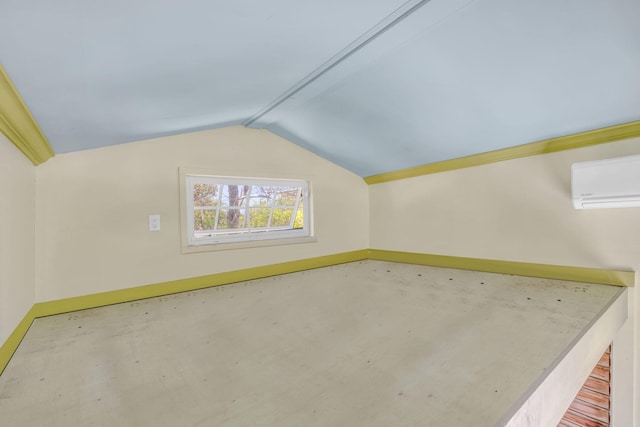 10 W Cook, Big Pine, FL 33043 - bonus room featuring an AC wall unit, baseboards, and vaulted ceiling