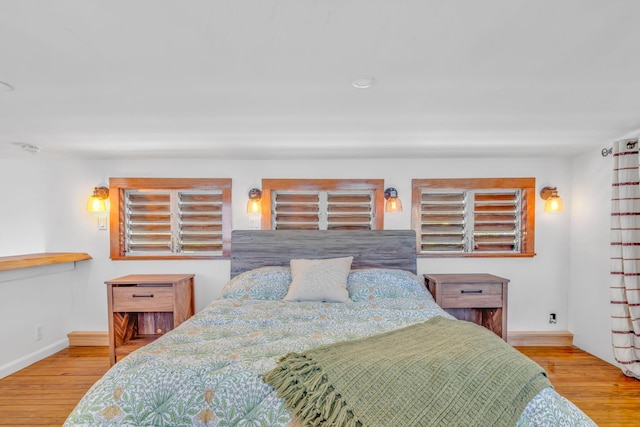 10 W Cook, Big Pine, FL 33043 - bedroom featuring baseboards and wood finished floors